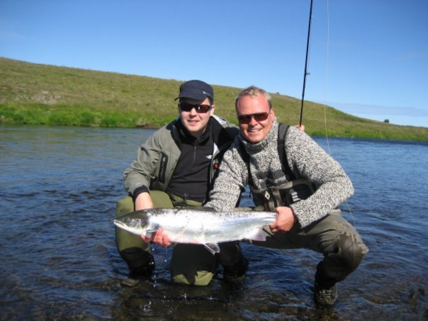 Fishing mates with a fresh fish
