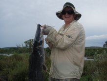 One happy fly fisher with a good sized catfish