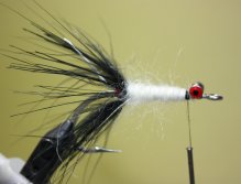 Wrap the yarn up the hook shank to create a body