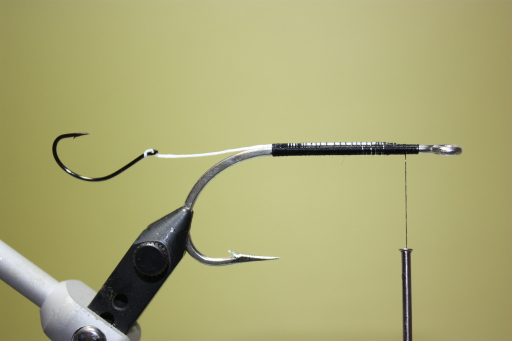 Bind down the Fireline.  (Optional: Apply brushable superglue to the shank of the hook)