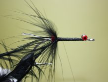 Select a black lady amherst feather. Tie in by the tip