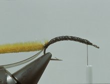 Step5 Tie in a narrow strip of Furry foam. If furry foam is not available use hare-tron or fine dubbing material