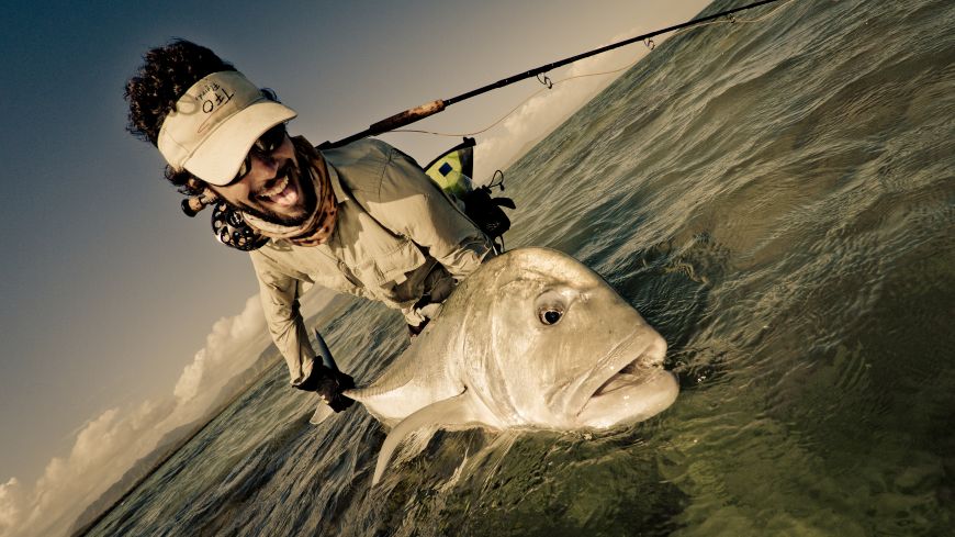 A nice GT sight fished on fly. Hooked on a flat while wading, a very powerfull fight!