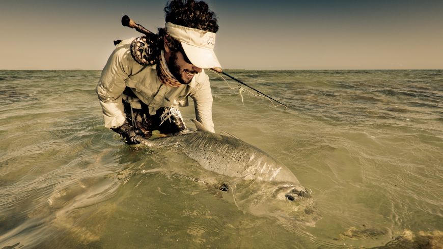 A nice GT sight fished on fly. Hooked on a flat while wading, a very powerfull fight!