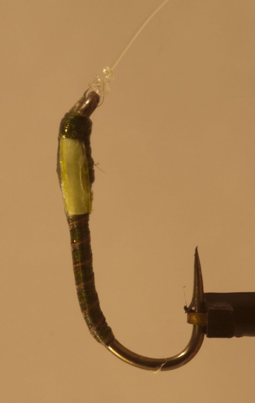 A green buzzer tied on a Kamasan B175 size 10