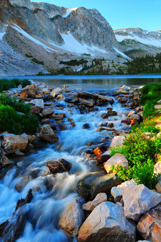 The Snowies, Lake Marie outlet in the Snowy Range Mountains in Wyoming, This magnificent mountain range gets over looked a lot but has a lot of neat country with a lot of fish along with some site seeing opportunities.