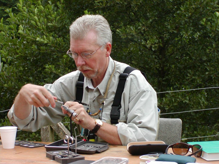 Fly tying at the river bank