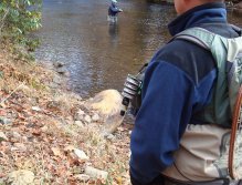 Guide Eugene Schular watches as Steve "NightCrawler" Patterson fishes a calm stretch of Raven's Fork