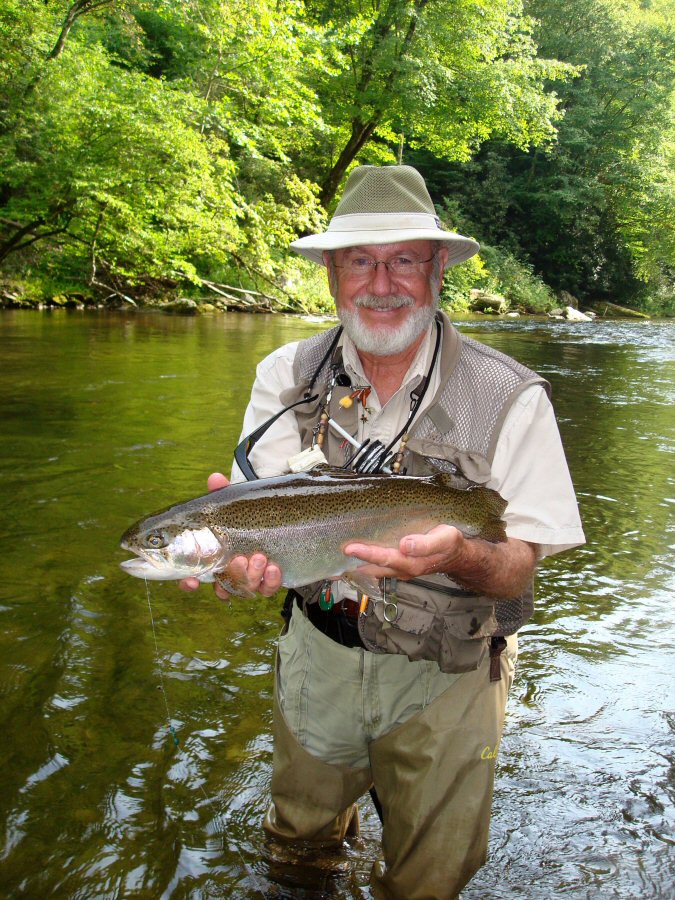 Author holding a beautiful rainbow trout caught in Raven's Fork 