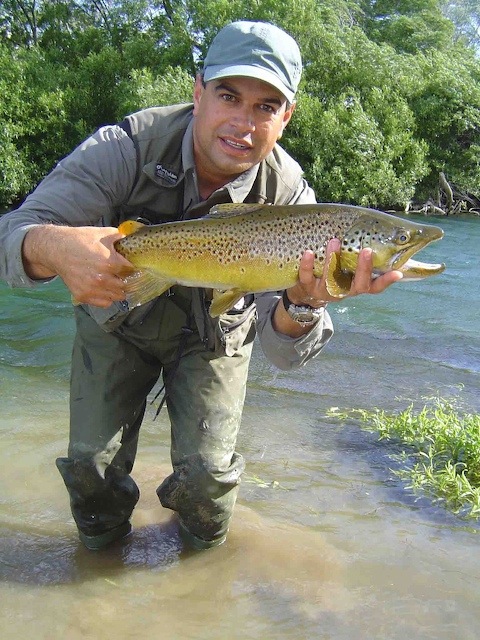 Earl our Cameraman take time out to land a fish