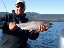 Author with another fine wild Eutsuk lake Rainbow (5lbs)