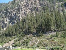 Madison River flowing by Escarpment