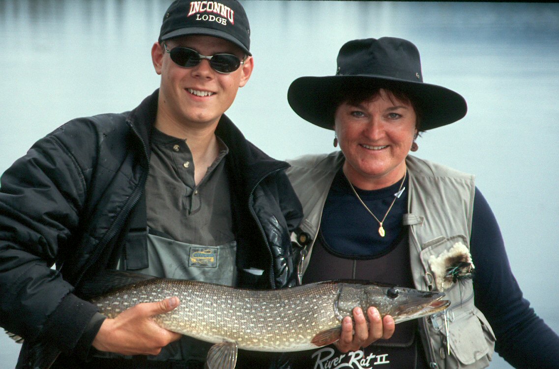 Ina and guide with one of the many pike that we caught that day