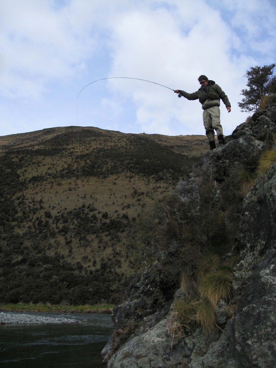 A 5lb brown threatens to pull the author into the river!